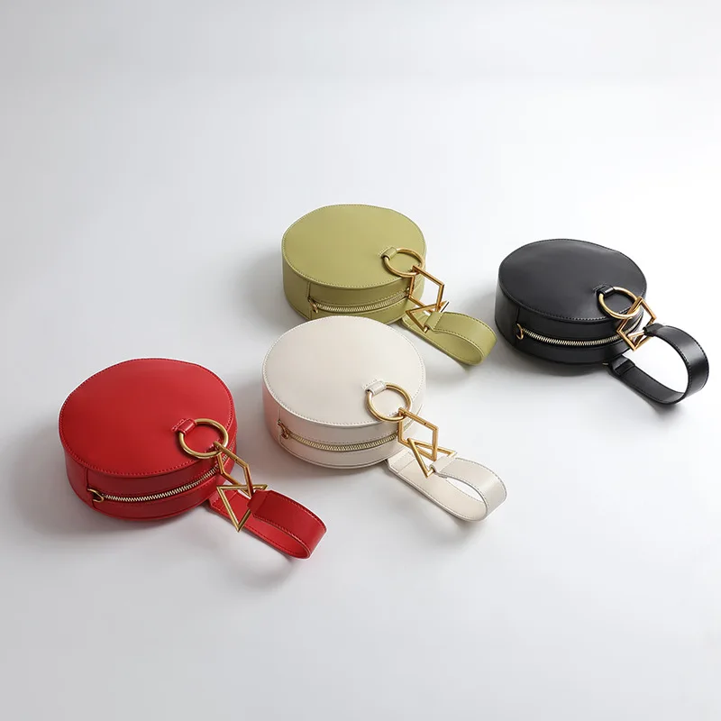 

2018 New Nifty Styling Geometric Hardware Round Women's Bag Full Moon Jewelry Box Hand Carry Simple Portable Round Bag Black Red