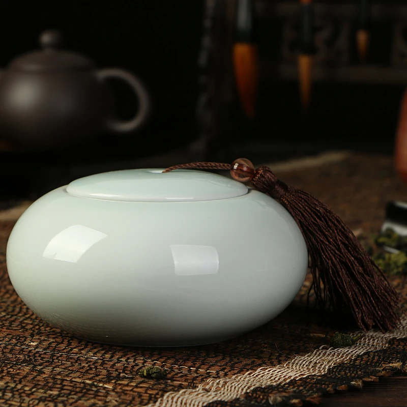 

Ceramic tea pot celadon jar with cover sealing small porcelain caddy storage tank food cans teacaddy 3 colors optional~