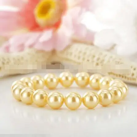 

Free Shipping >>>>> stunning 10-11mm natural south seas gold pearl bracelet 7.5-8inch
