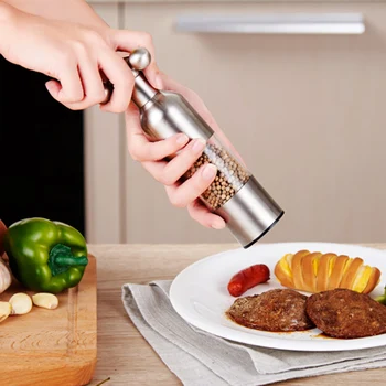 

1pcs Kitchen Creative gadgets kitchen knife Pepper mill Black Pepper mill Garlic mill Spice the grinder
