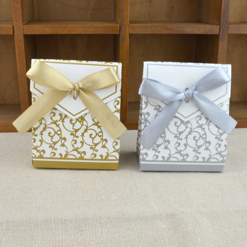 

50pcs Golden Silver Age Laser Cut Gift Candy Boxes Favor Gifts Bags With Ribbon European Style Wedding Birthday Party Supplies