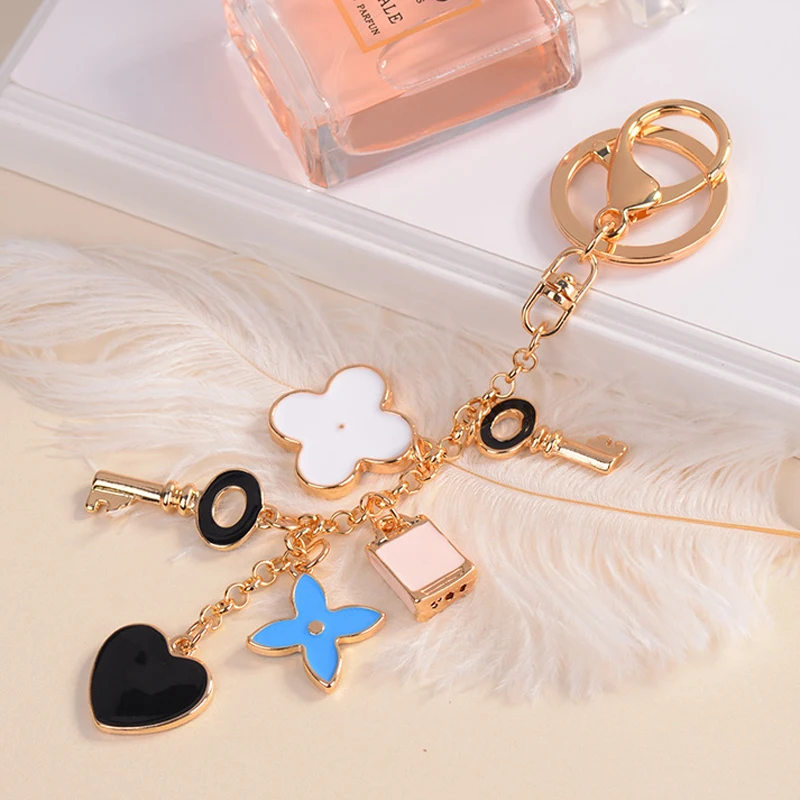 

Colourful Enamel Flower Key Clover Heart Charms Pendant Keychain Gold Color Chain Tassels Key Ring Women Trinket Jewelry