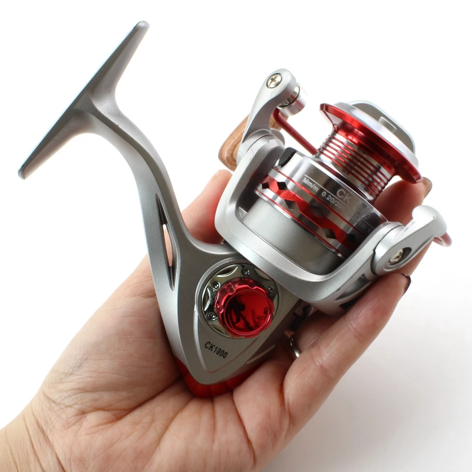 Carretel de Pesca Rolamentos de Esferas Nova Promoção! 12 Ck1000 7000 5.2: 1 Intercambiáveis Dobrável Handle Pesca Spinning Reel Fishing Reel 14 Esporte e Lazer