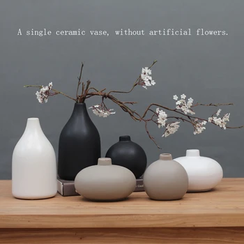 

Classic black / white ceramic sculpture Chinese arts and crafts Decor contracted porcelain flower vase creative gift home decor