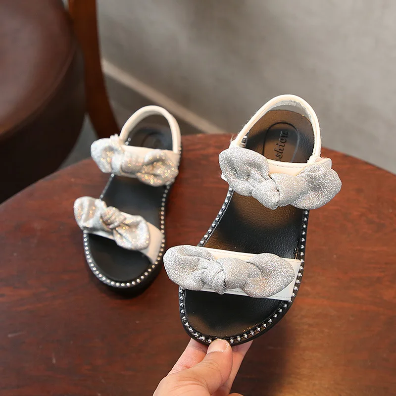 High quality Summer Fashion Girl Sandal Children Girls Flat Rome Sandal Bling Bling bowknot Kids Shoes black silver High quality Summer Fashion Girl Sandal Children Girls Flat Rome Sandal Bling Bling bowknot Kids Shoes black silver