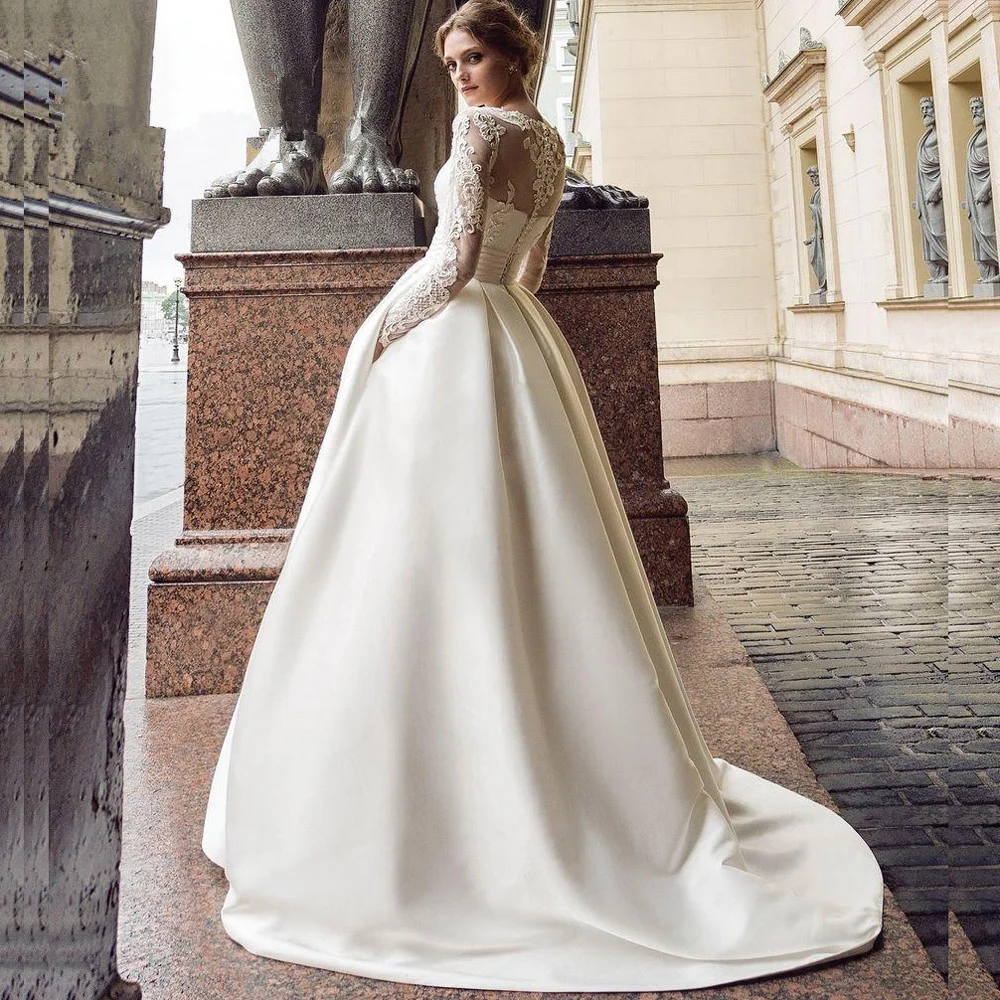 Modest-Long-Sleeve-Wedding-Dresses-Turkey-Scoop-Satin-Appliqued-A-line-Bridal-Gown-with-Pockets-Vestidos (1)