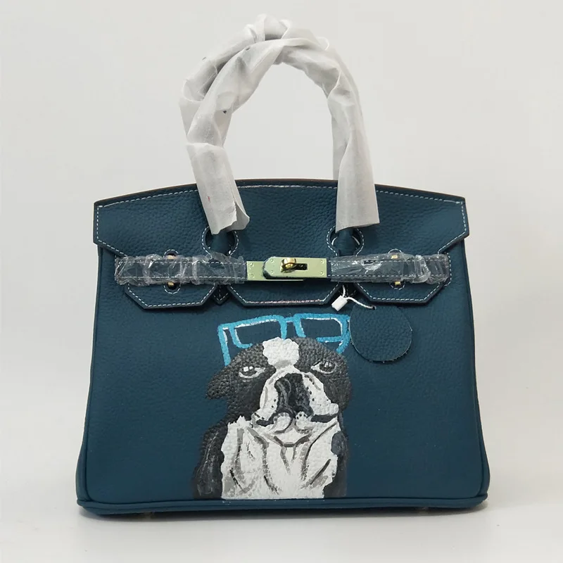 

2019 Europe Genuine Leather Luxury design Personality manual Cartoon Dog painting bag Gold Hardware Light blut 30CM Shoulder Bag