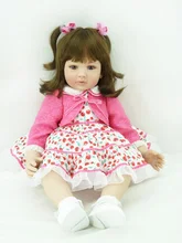 Muñeca reborn de 55 cm con chaqueta rosa