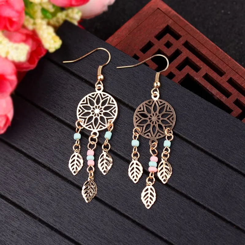 

TopHanqi Hollow Flower Round Shaped Drop Earring Ladies 2019 Boho Vintage Metal Leaf Pendant Tassel Dangling Earrings For Women
