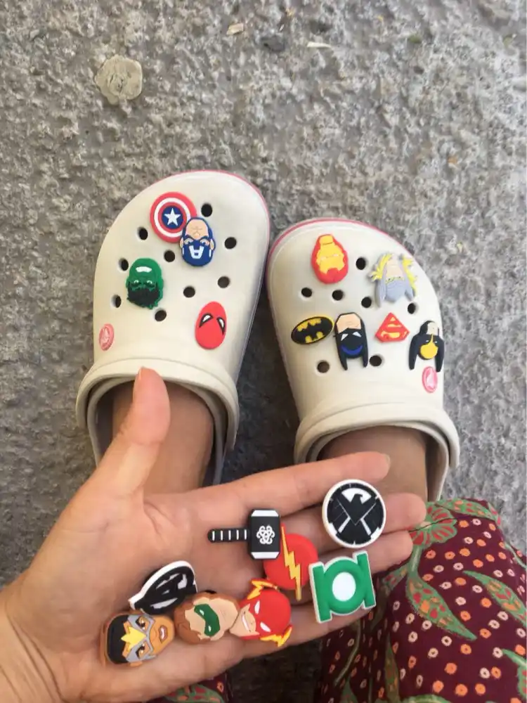 black crocs with charms