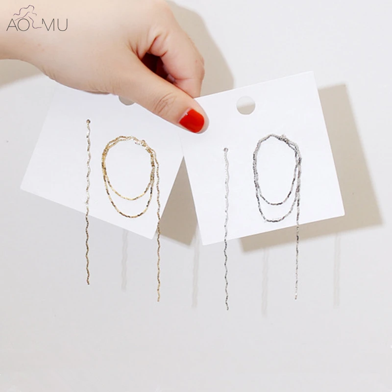 

AOMU Korea Personality Metal Gold Silver Geometry Asymmetrical Twist Wave Line Snake Bone Chain Long Tassel Earrings for Women