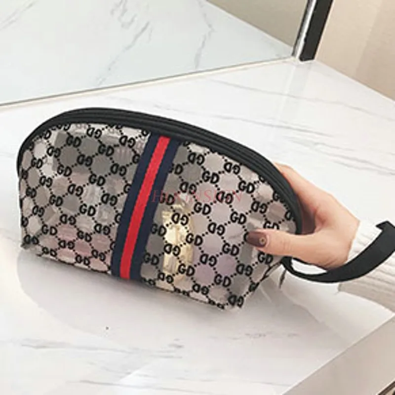 

Cosmetic bag mesh flocking handbag South Korea new women's handbag cosmetics storage bag mobile phone purse