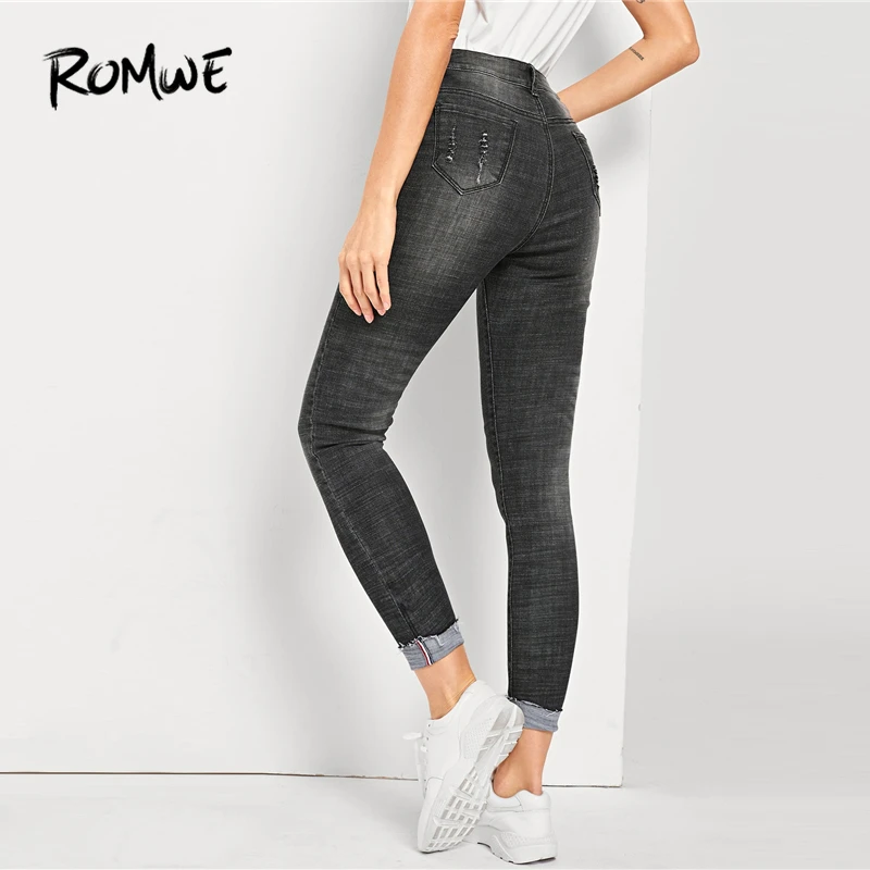 ripped faded black jeans