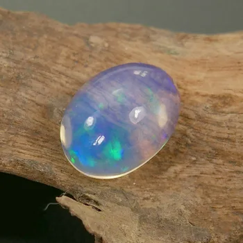 

10.72 Carat Natural Mexican Opal Loose Gemstone Blue Play Color Certificate