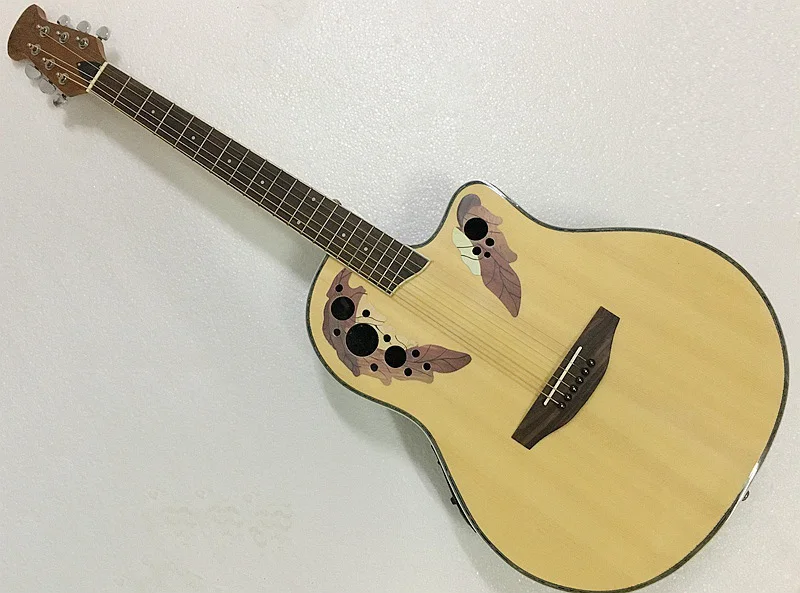 solid wood top electric round back ovation model guitar