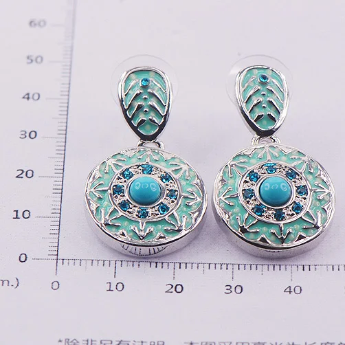 

Серьги из серебра 925 пробы с зелеными кристаллами цирконием и эмалью TE407