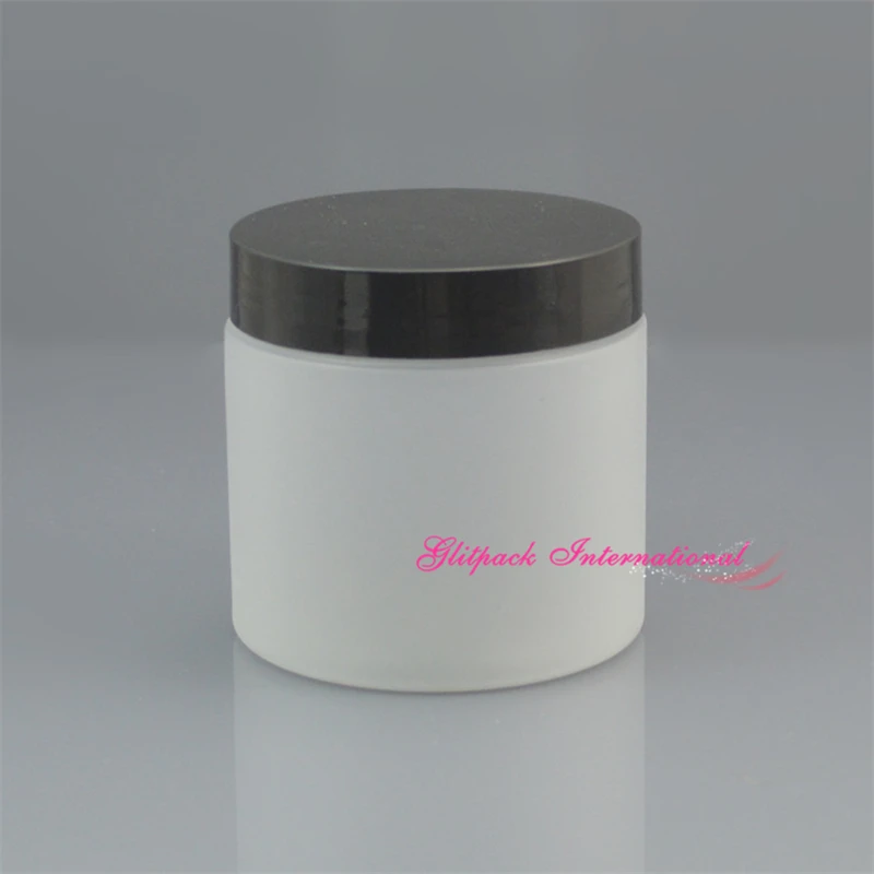 black lid cream jar