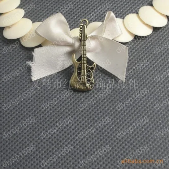 

100 шт./лот бусины из цинкового сплава с античным бронзовым покрытием Подвески подходят для ювелирных изделий 38*13 мм гитарные части форма JJA1714