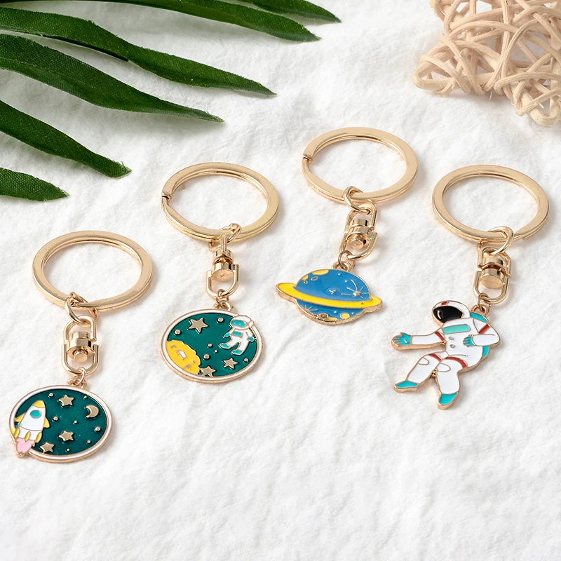 

Galaxy Planet Astronaut Keychain 4 Styles Outer space Universe Sky Rocket Keyring For Women Men Key chains Fashion Jewelry Gift