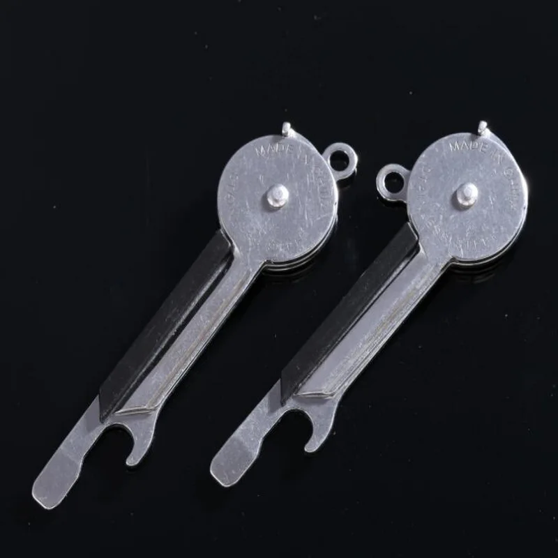 

Outdoor multi-function mini EDC combination tool, bottle opener key knife buckle word screwdriver