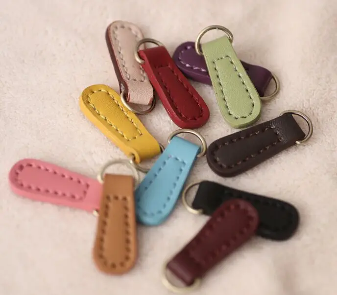 Corium zipper Bags clothing fitting leather hand stitched oval ring