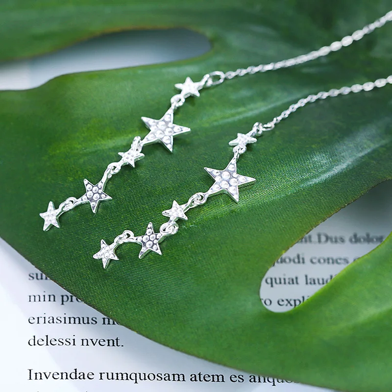 

Beautiful CZ Dangling Stars 925 Sterling Silver Earrings