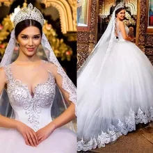 Свадебные и Бальные платья, из прозрачной ткани кружево, аппликация бисером с украшением в виде кристаллов с открытой спиной с длинным шлейфом сзади размера плюс, свадебные платья