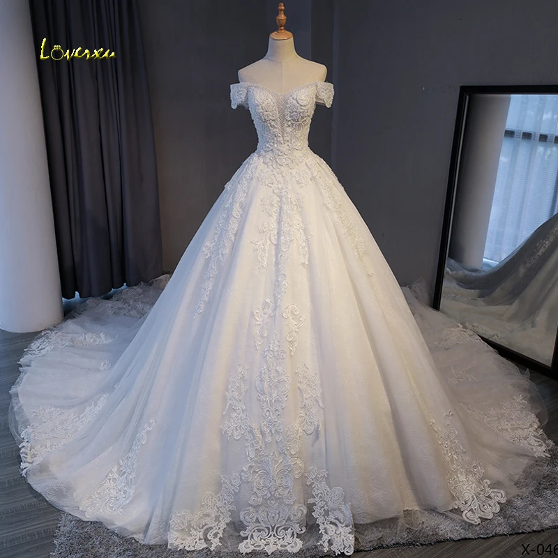 

Loverxu Gorgeous Appliques Lace Chapel Train A-Line Wedding Dress 2020 Luxury Beaded Boat Neck Sexy Bridal Gown Vestido de Noiva