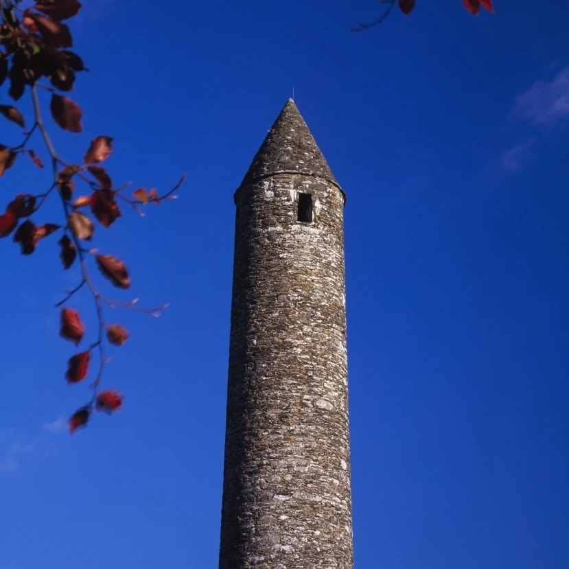 Round Stone Tower At Glendalough Poster Print (28 x 34)
