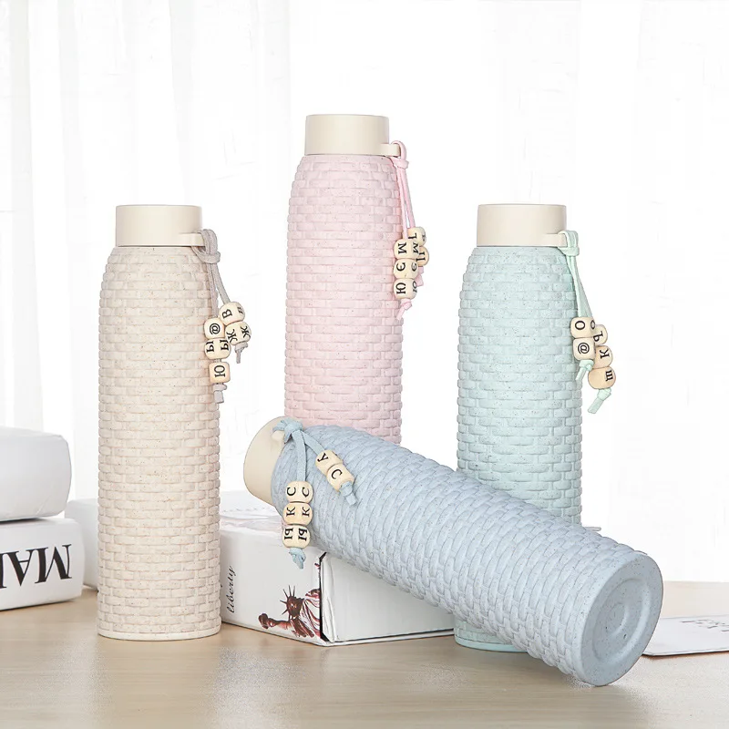 

High quality creative portable wheat straw type rattan glass water cup leakproof anti-squeezing fresh milk drinking water bottle