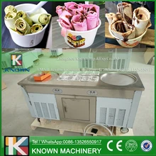 Free shipping supply the 220 / 110 V fried ice cream roll ice pan machine with 2 round pans 10 cooking tanks and 1 refrigerator