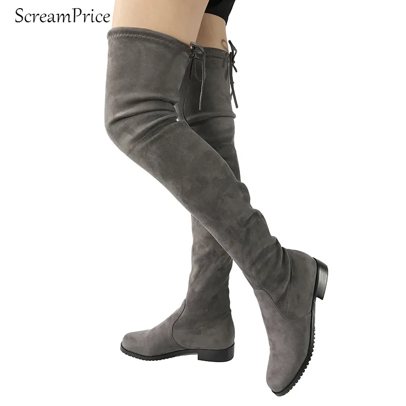tall over the knee flat boots