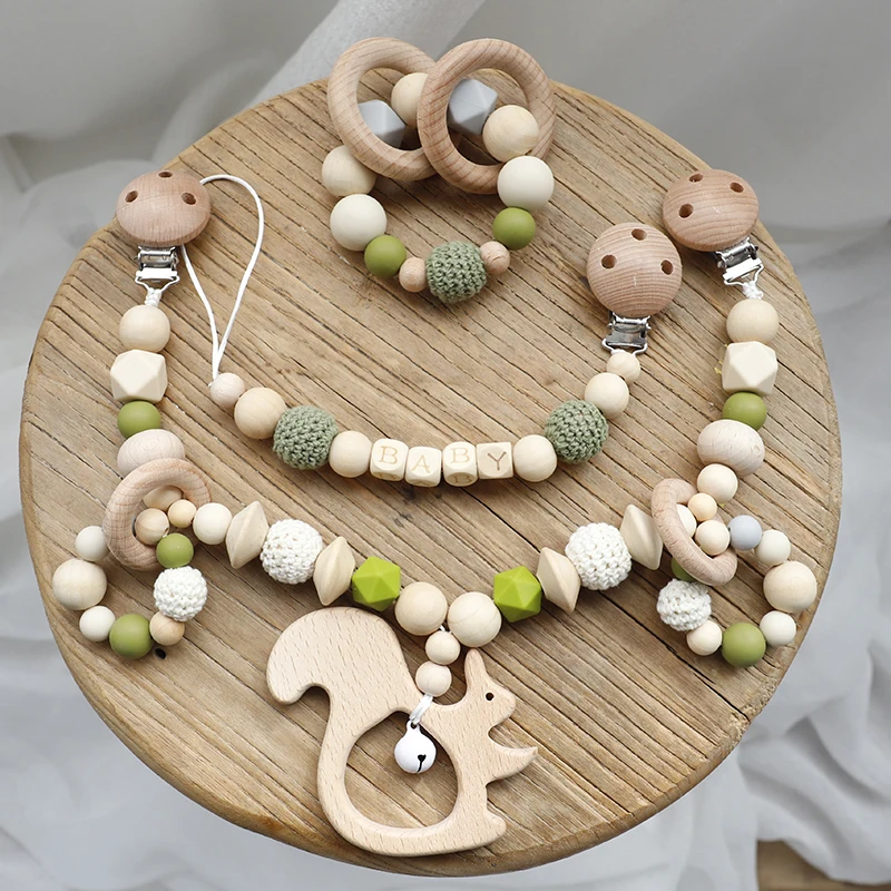 Bébé jouets Silicone perles dents anneaux en bois à la main Bracelet sucette chaîne Clips dentition landau poussette cloche bébé produits