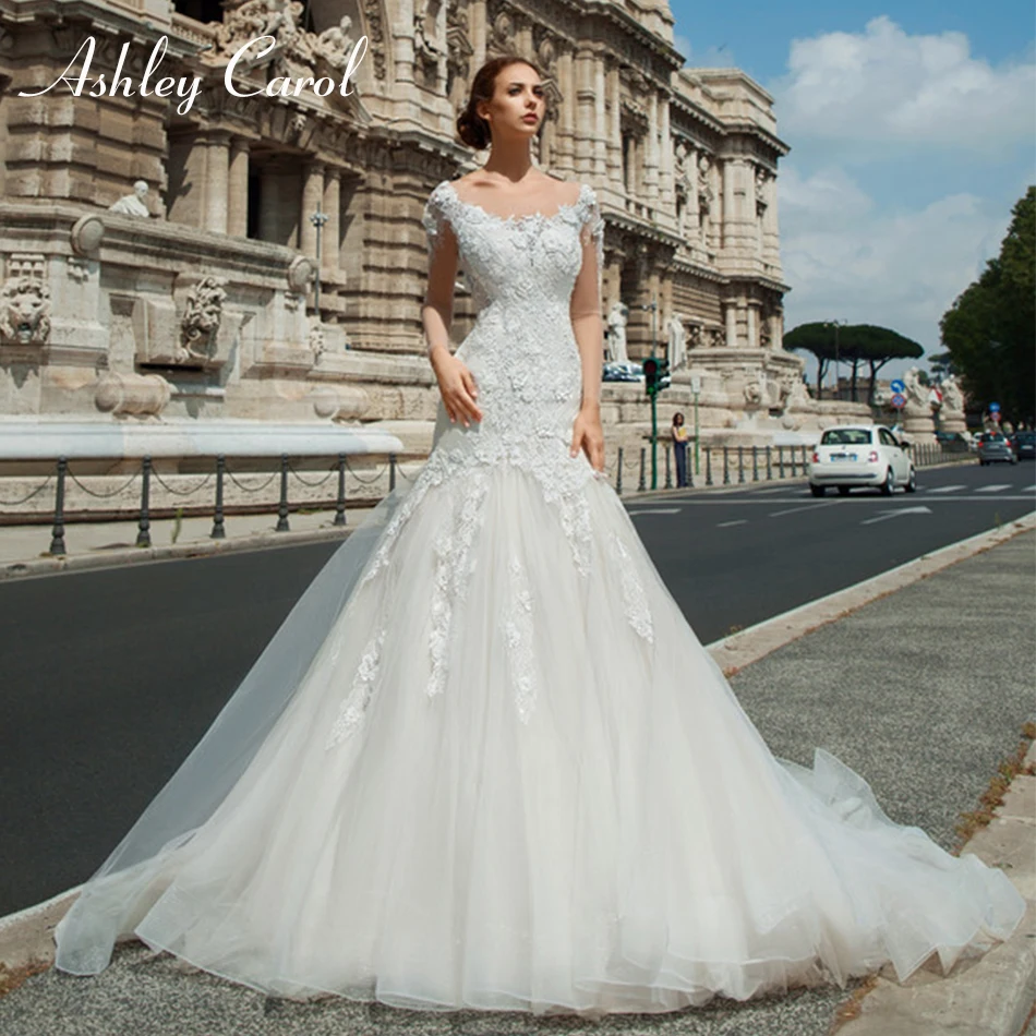 

Ashley Carol Sexy Scoop Long Sleeve Backless Mermaid Wedding Dresses Appliques Court Train Bride Dress Romantic Wedding Gowns