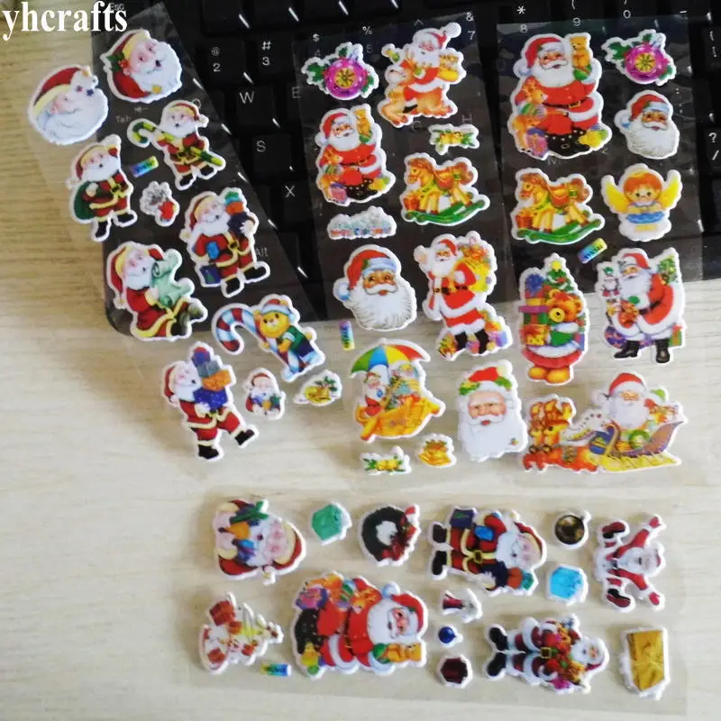 

4 sheets(45PCS stickers) / LOT.Plastic sponge removable Christmas stickers Wall fridge stickers Decorative home Kids diy toys