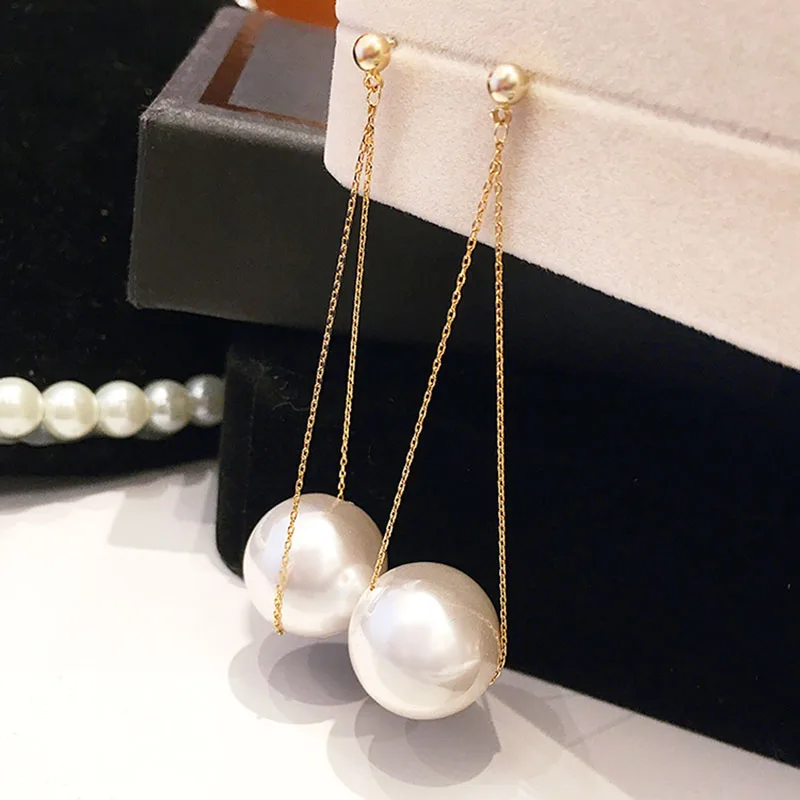 

Korean version of the big pearl earrings 2019 new tide female long section temperament earrings net red exaggerated earrings