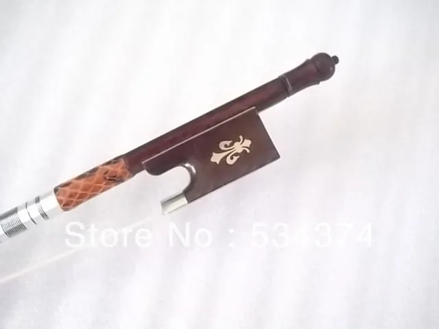 

Carved British designs with snake skin , Serpentine wood violin bow , best Mongolia horse tail and best elastic,size 4/4,1/4