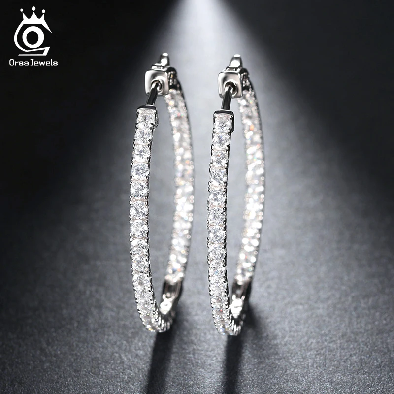 ORSA JEWELS 2018 Silver Color High Polished Hoop Earrings Paved with AAA Austrian Cubic Zirconia for Wedding Party Jewelry OE137 цена ORSA JEWELS 2018 Silver Color High Polished Hoop Earrings Paved with AAA Austrian Cubic Zirconia for Wedding Party Jewelry OE137 цены онлайн