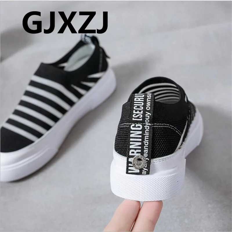 

Flying woven mesh breathable fashion round head flat bottom wild casual female 2019 summer cool set foot shoes