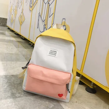 

Hot Selling Large Capacity Candy Color Canvas Backpack Heart Letter Print Travel Daypack for Teen -B5