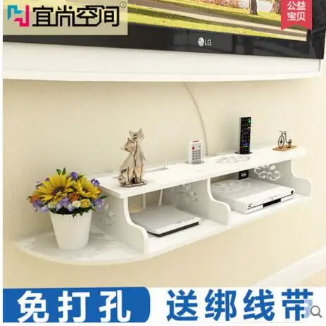 

The wall wall of the set-top box is mounted on the wall of the rack and the living room decoration router receives the box