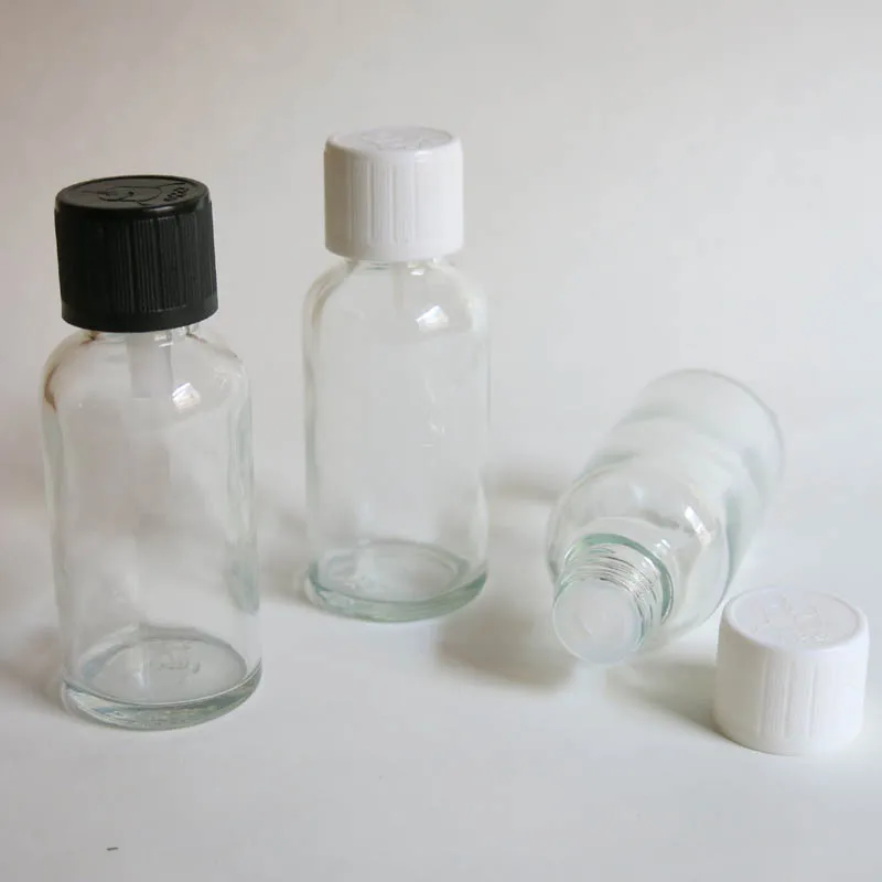 

100pcs 30ml clear glass bottle with reducer dropper and tamper evident lid, screw on 1oz clear essential oil bottle wholesale