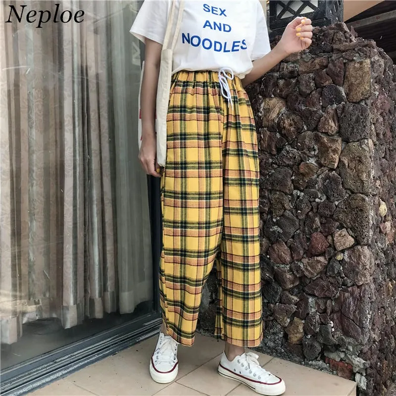 yellow pants with checkered stripe