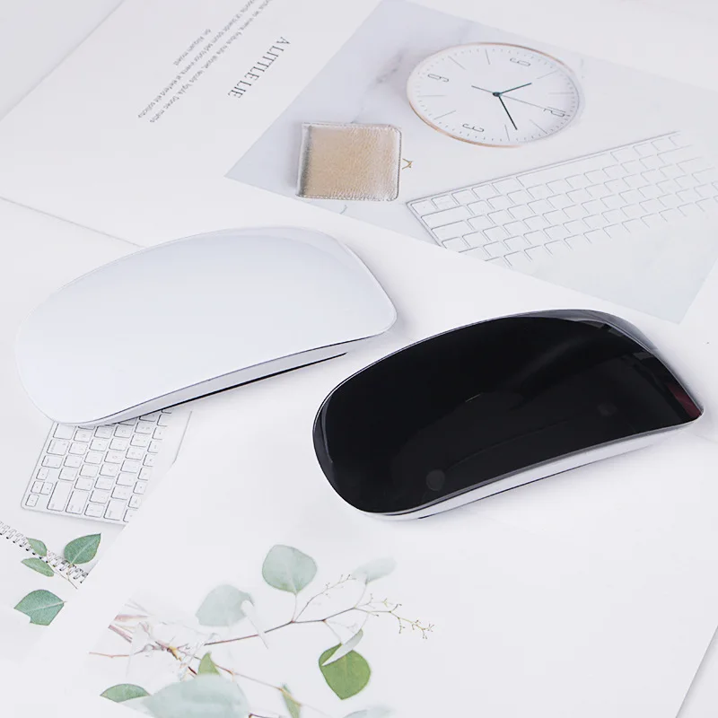 

Wireless Touch Mouse 2.4G Ultra-Thin Black And White Photoelectric Touch Rats