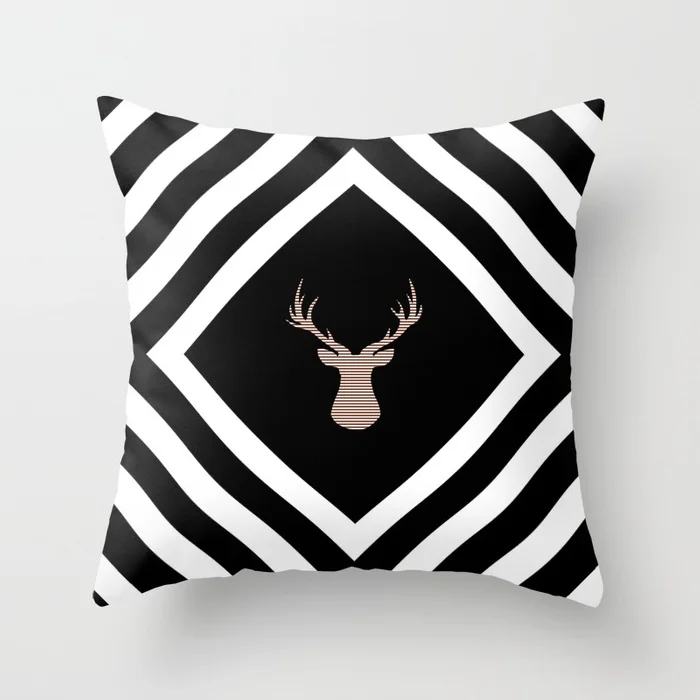 abstract-geometric-pattern-deer-black-brown-and-white-pillows