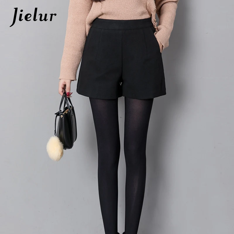 Tanie Jielur jesień koreański mody czarne krótkie spodenki dla kobiet zima klasyczny w stylu basic casual szerokie nogawki krótkie Femme luźne zamek błyskawiczny wełniane szorty