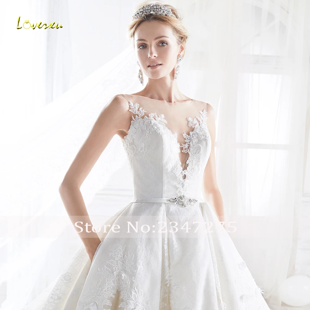 Loverxu Vestido De Noiva пикантные Иллюзия кружево Свадебные платья Роскошные Аппликации бисером и пуговицы суд поезд линия свадебное платье