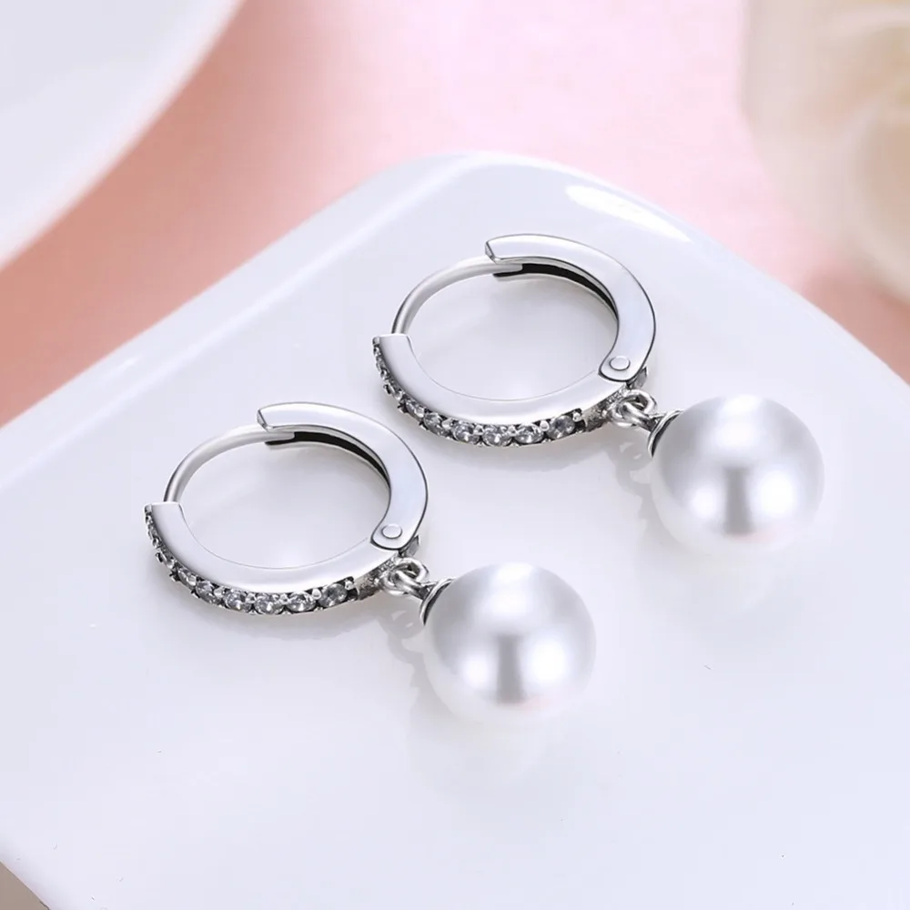 Wholesale Korean cute pearl earrings fancy plain drop earringin Drop