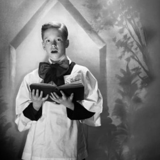 Choir boy holding a book and singing Poster Print (24 x 36)