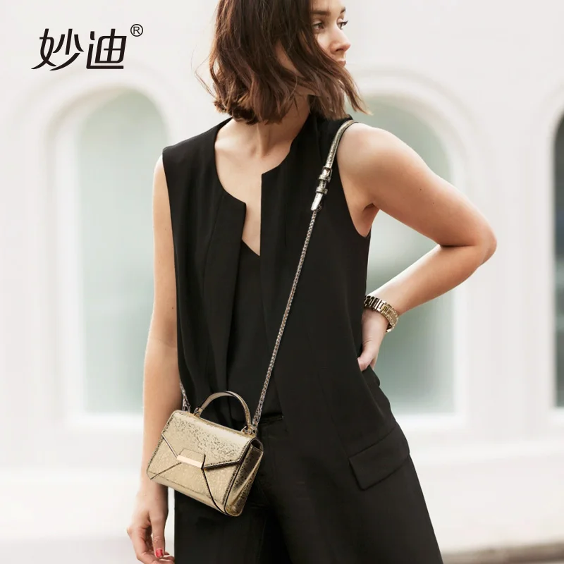 

A2025 Fashion women Mini flap chain shoulder bags Raindrops grain Metallic metallic Metal Chains messenger bags crossbody Bolsas